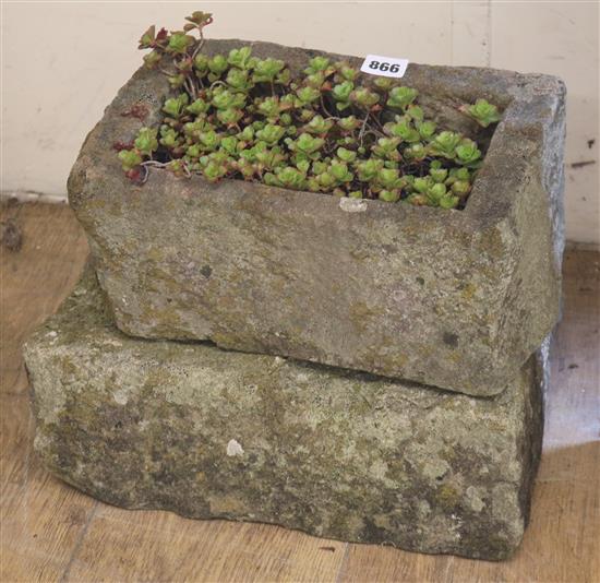 A rectangular stone planter
